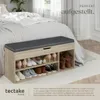 A shoe bench with storage is placed next to a bed in a bedroom. Náhled obrázku produktu