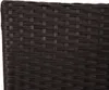 A close-up view of the woven texture of a brown rattan material. Náhled obrázku produktu
