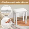 A white vanity stool with decorative carvings on the front, placed on a rug. Inset circles highlight the stool's padding and dimensions. Voir les images du produit