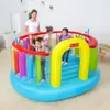 A woman supervises four children playing in a colorful inflatable bouncer. Anteprima dell’immagine prodotto