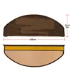 Two views of a brown, semi-circular stair mat with dimensions indicated. Produktbild-Vorschau