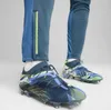 Close-up of Puma football boots and trousers. Náhled obrázku produktu