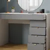 A close-up view of a white and gray vanity desk with several drawers. Anteprima dell’immagine prodotto