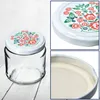 A collage of images showing a glass jar with a decorative lid, a close-up of the lid's design, and a close-up of the jar's rim. Anteprima dell’immagine prodotto