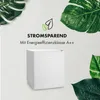 A white mini-fridge is shown against a white background, surrounded by large green leaves. Text indicates energy efficiency. Produktbild-Vorschau