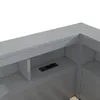 A close-up view of a gray bed frame with built-in shelves and an electrical outlet with USB ports. Produktbild-Vorschau