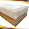 A close-up, angled view of a bed frame with a mattress and a textured beige fabric border. Náhled obrázku produktu