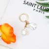 Portachiavi con conchiglia e perline, set regalo per donne Anteprima dell’immagine prodotto 3