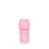 A pink baby bottle with a lid, isolated on a white background. Podgląd zdjęcia produktu