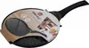 A grill pan with packaging and a chef in the background. Produktbild-Vorschau