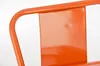 A close-up shot of an orange metal chair back. Podgląd zdjęcia produktu