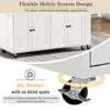 A close-up view of a white kitchen island with wheels, highlighting its mobility features. Podgląd zdjęcia produktu