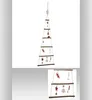 A hanging Christmas tree decoration made of wooden branches and string, adorned with small ornaments. Podgląd zdjęcia produktu