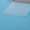 A close-up of a clear screen protector on a blue surface. Produktbild-Vorschau