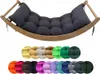 A rocking chair cushion in graphite color, displayed with a variety of color swatches below. Produktbild-Vorschau