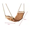 A beige braided hammock swing shown suspended against a white background with dimensions indicated. Podgląd zdjęcia produktu