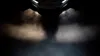 A car's headlights illuminating the ground at night, showing a comparison between two different types of bulbs. Produktbild-Vorschau
