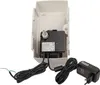A condensate pump unit with its power adapter, displayed against a white background. Náhľad obrázku produktu