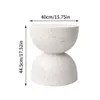 A speckled white hourglass-shaped side table with dimensions indicated. Podgląd zdjęcia produktu