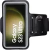 A black armband for a smartphone, with a phone displaying a Samsung Galaxy S23 Ultra screen inside it. Produktbild-Vorschau