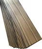 A stack of wooden planks with a dark and light striped pattern, arranged diagonally against a white background. Podgląd zdjęcia produktu
