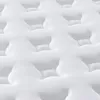 A close-up, detailed view of a white quilted mattress surface. Anteprima dell’immagine prodotto