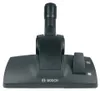 A vacuum cleaner floor head and nozzle attachment. Produktbild-Vorschau
