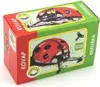 A toy ladybug wind-up toy in its packaging. Produktbild-Vorschau