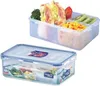 Two transparent food storage containers, one filled with food and the other empty. Voir les images du produit