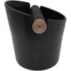 A close-up studio shot of a black coffee knock box. Produktbild-Vorschau