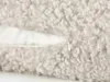 Close-up of a textured pillowcase with a zipper. Produktbild-Vorschau