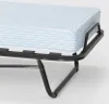 A close-up view of a folded bed with a striped mattress. Anteprima dell’immagine prodotto