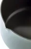 Close-up view of the rim and interior of a pot or pan. Náhled obrázku produktu