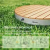 A round wooden product on a grassy lawn, with text and diagrams explaining its features. Produktbild-Vorschau