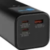 Close-up of the ports and display of a black power bank. Náhled obrázku produktu