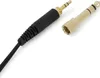 A close-up shot of two audio connectors on a white background. Voir les images du produit