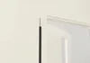 A close-up of a black cable with a gold tip, against a neutral background. Náhled obrázku produktu