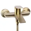 A close-up studio shot of a gold-colored bathtub faucet. Anteprima dell’immagine prodotto
