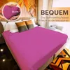 A bed with pink fitted sheets and pillows, with a close-up inset showing the sheet's depth. Produktbild-Vorschau