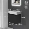A diagram showing the dimensions of a black vanity unit with a white sink and faucet. Produktbild-Vorschau