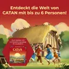 People dancing in front of a thatched-roof building with a box of Catan game in the foreground. Anteprima dell’immagine prodotto