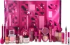 A makeup advent calendar with various makeup products displayed in front of it. Náhľad obrázku produktu