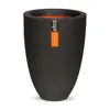 A black planter with an orange interior and a label on the side. Produktbild-Vorschau