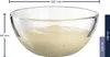 A clear glass bowl filled with a creamy sauce, with dimensions indicated by measurement lines and text. Anteprima dell’immagine prodotto