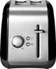 A close-up studio shot of a black and silver two-slice toaster. Voir les images du produit