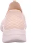 The back view of a beige sneaker. Voir les images du produit