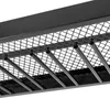 A close-up view of a black metal ceiling wine rack with a mesh grid and angled holders for wine bottles. Podgląd zdjęcia produktu