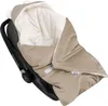 A baby car seat with a hooded blanket. Produktbild-Vorschau