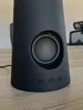 A close-up view of a black speaker with buttons on the base. Anteprima dell’immagine prodotto