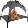 A dog is lying on an elevated pet bed with a canopy. Produktbild-Vorschau